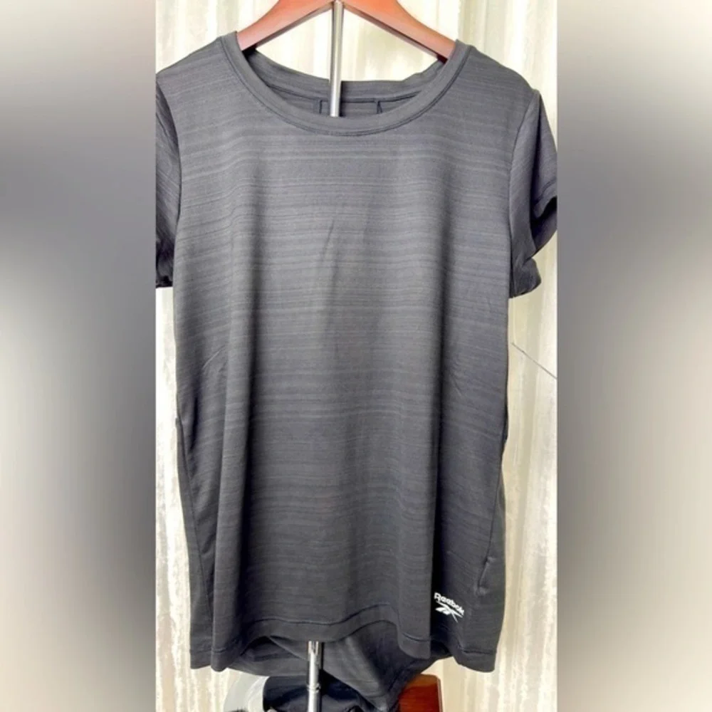 Reebok women’s small slim fit black athletic shirt
